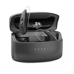 Black hearing aid device with charging case on a white background